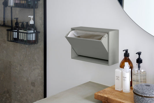 Grøn væghængt affaldsspand med pose