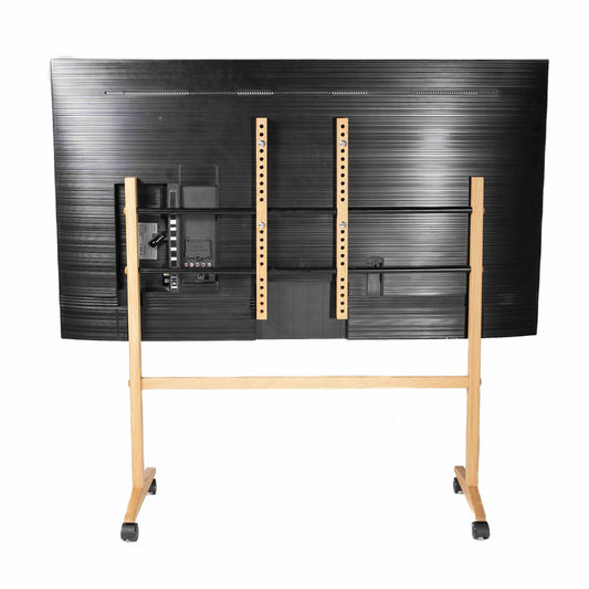 Tv stander med fjersyn på, set bagfra